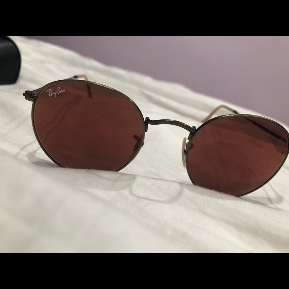 Ray Ban Sunglasses red lenses.